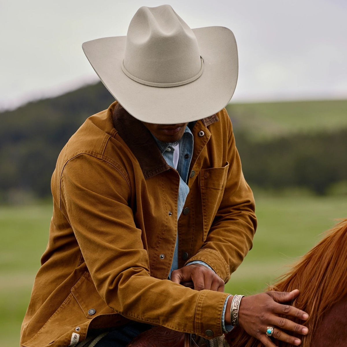 Cowboy wearing a Stetson Skyline Silverbelly felt hat
