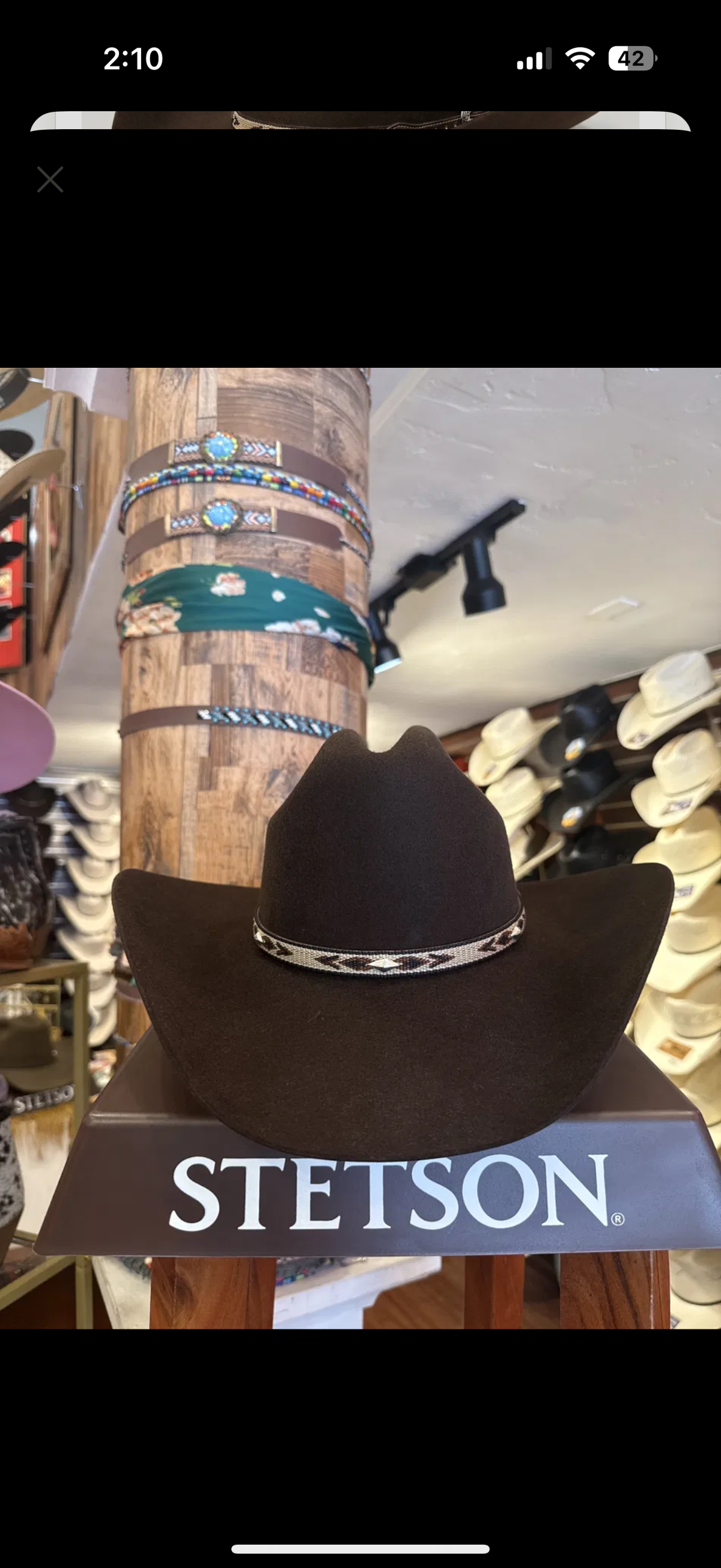 The Copperhead chocolate Stetson on display stand