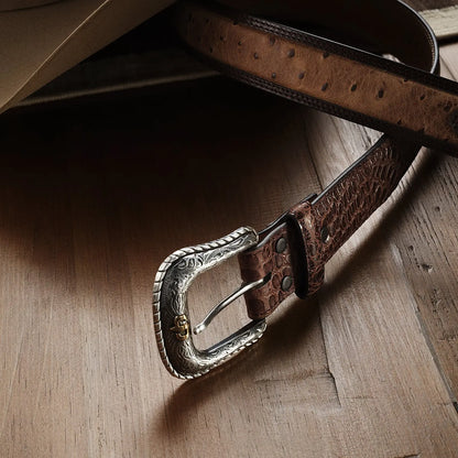 Stetson ostrich print western belt worn with jeans