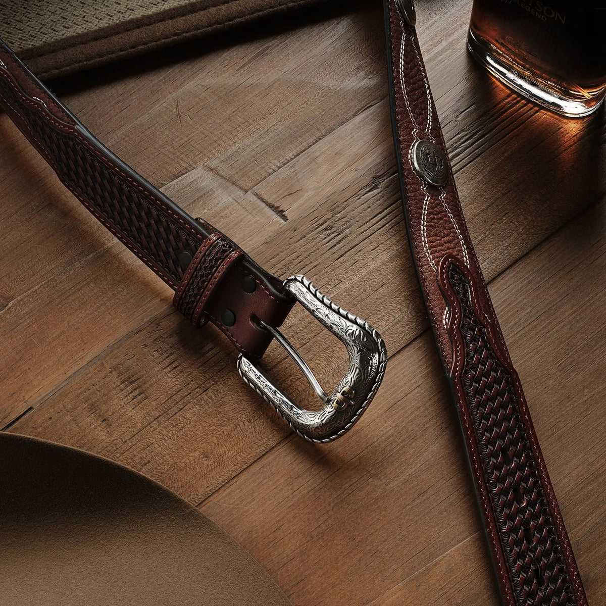 Stetson natural brown basket weave belt worn with jeans