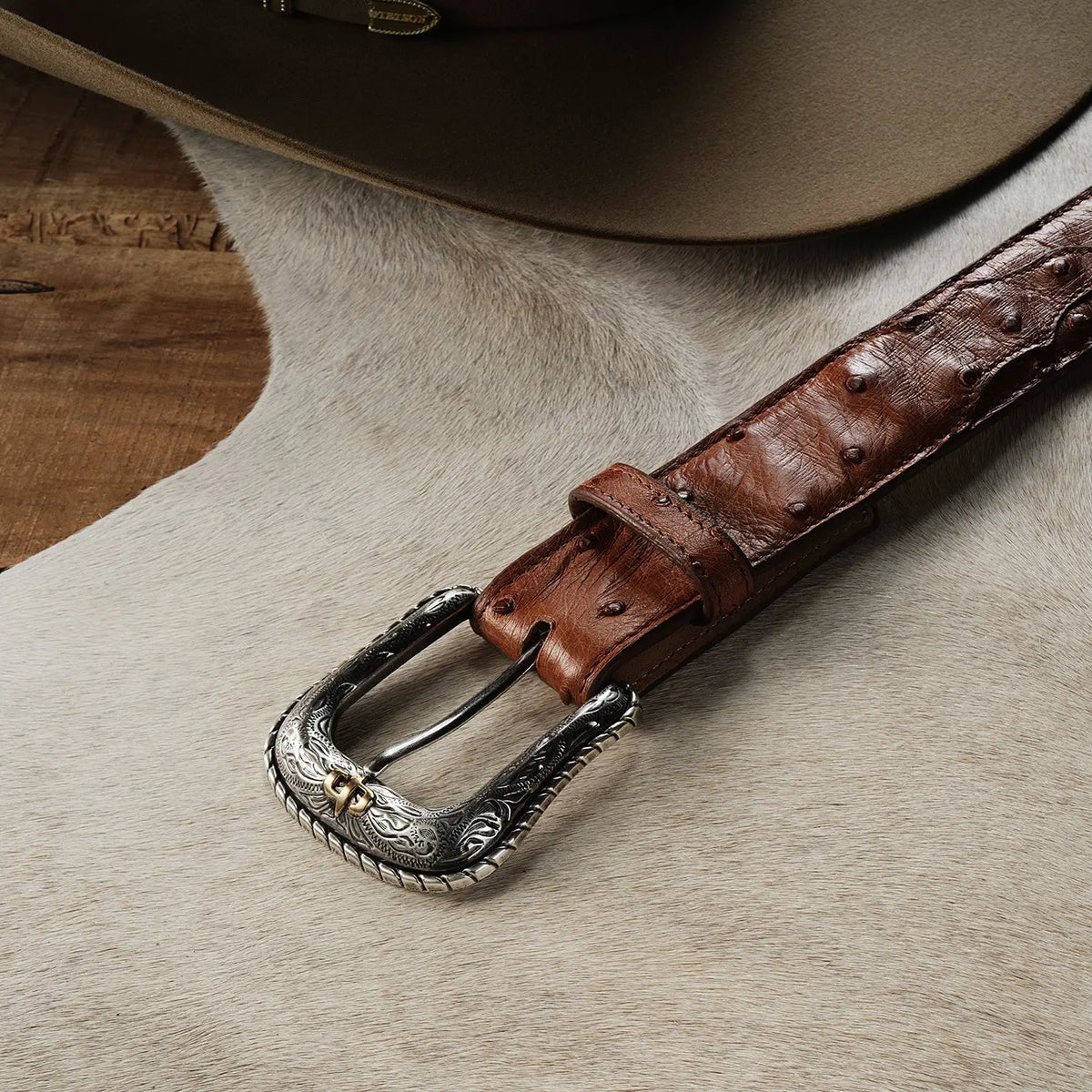 Stetson antique cognac ostrich belt worn with jeans