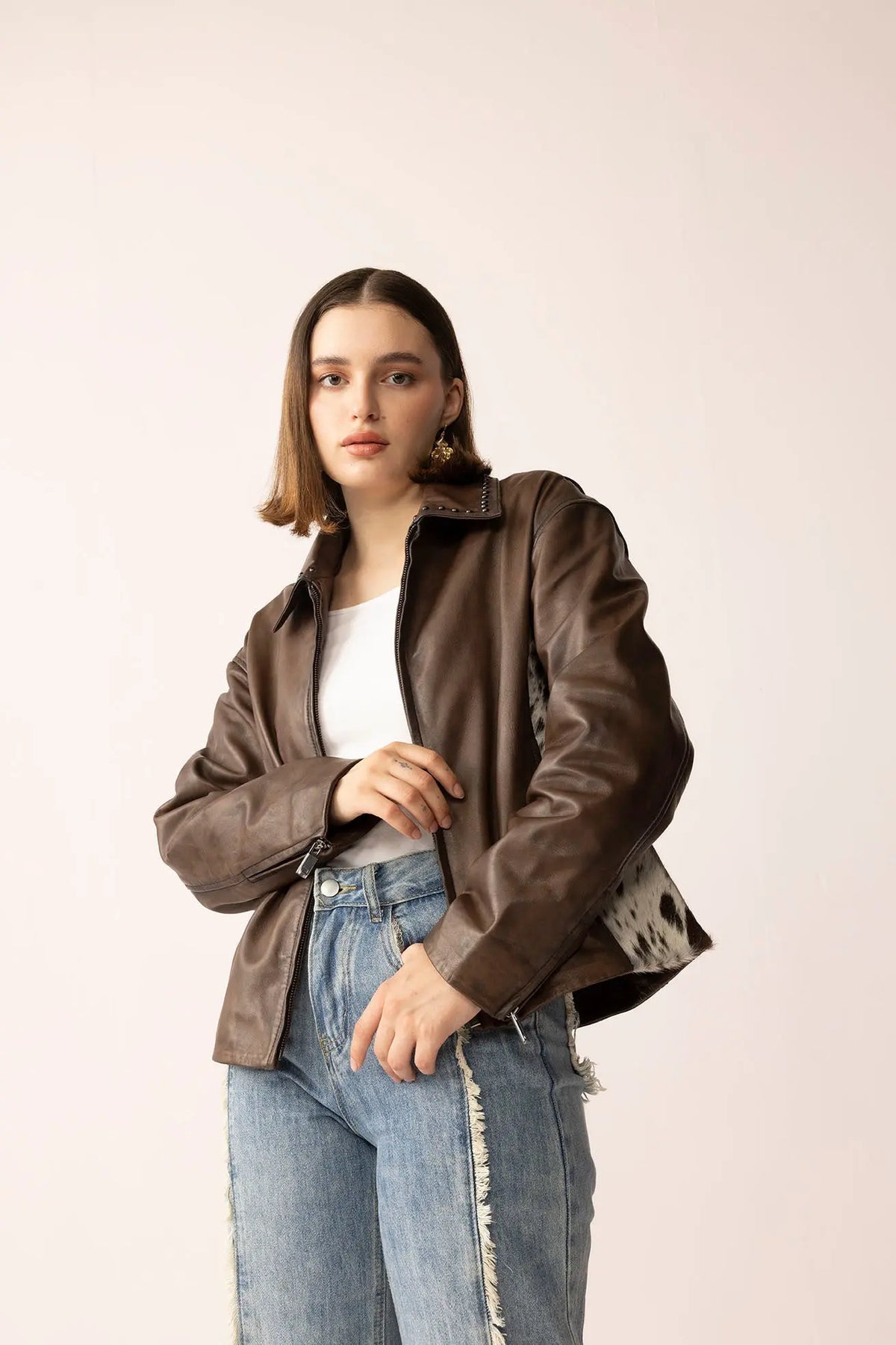 Emberhide women's brown leather jacket with hair-on cowhide panels